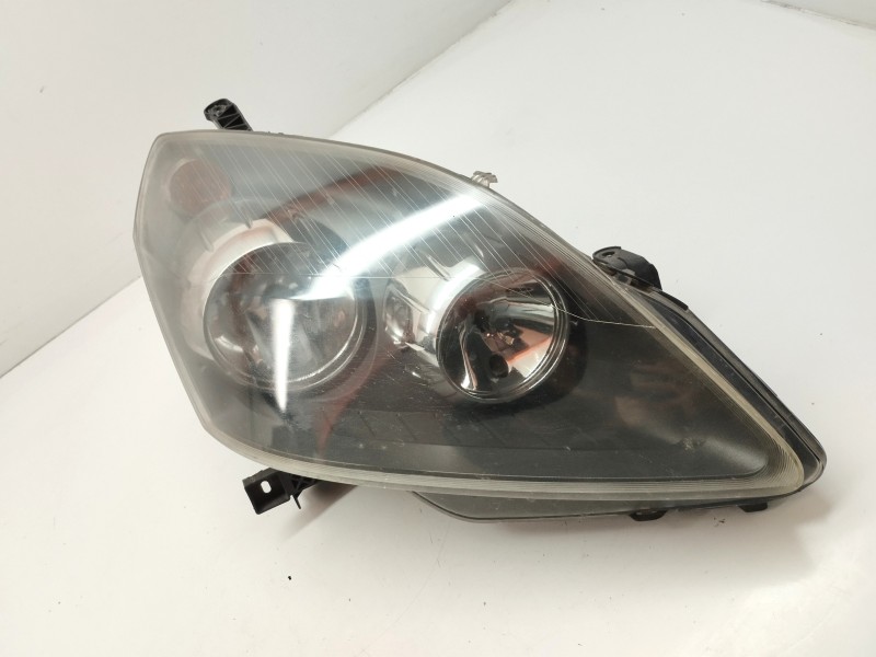 Recambio de faro derecho para opel zafira b 1.9 cdti referencia OEM IAM 13252473  