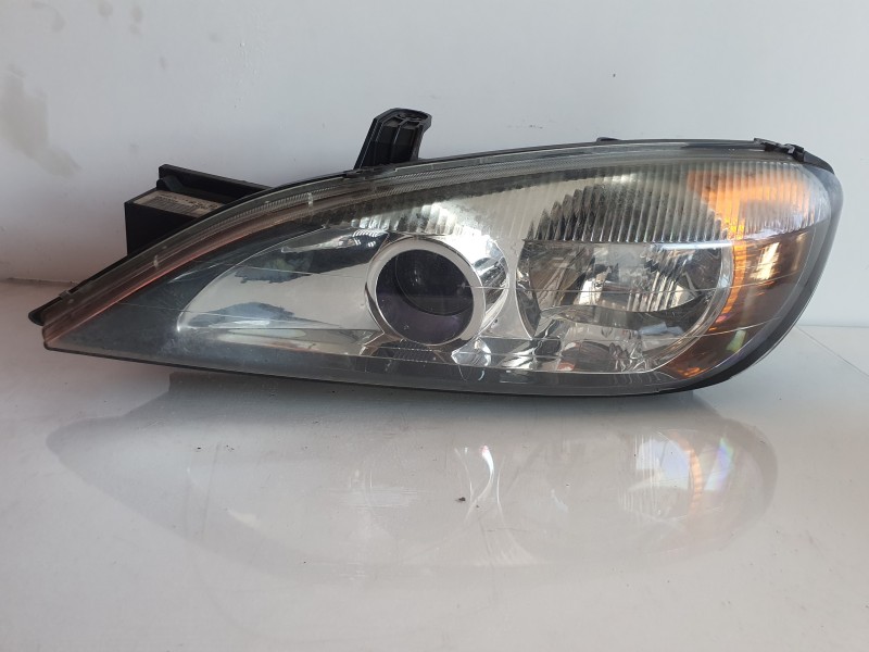 Recambio de faro izquierdo para nissan primera berlina (p11) referencia OEM IAM 89003044  