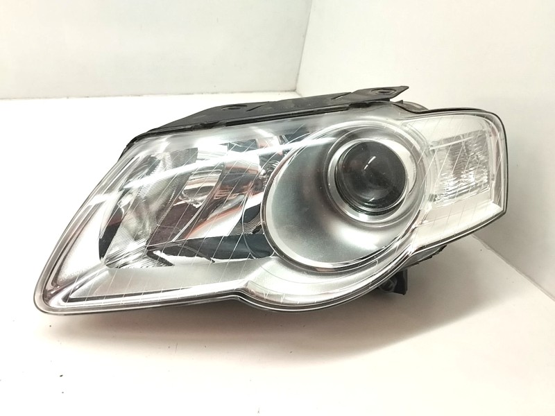 Recambio de faro izquierdo para volkswagen passat variant (3c5) 2.0 tdi referencia OEM IAM 89312179  
