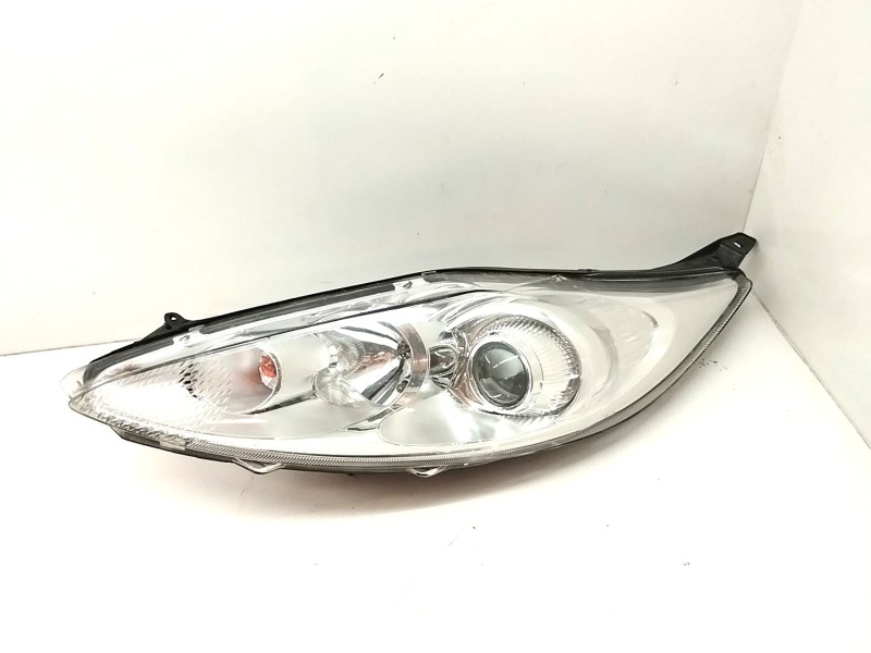 Recambio de faro izquierdo para ford fiesta (cb1) titanium referencia OEM IAM 4311187L  